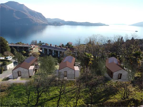 Immersa nella natura, villa di design vista lago 